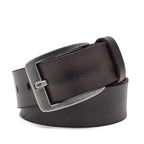 Angled brown leather belt with square antique-silver buckle and visible adjustment holes