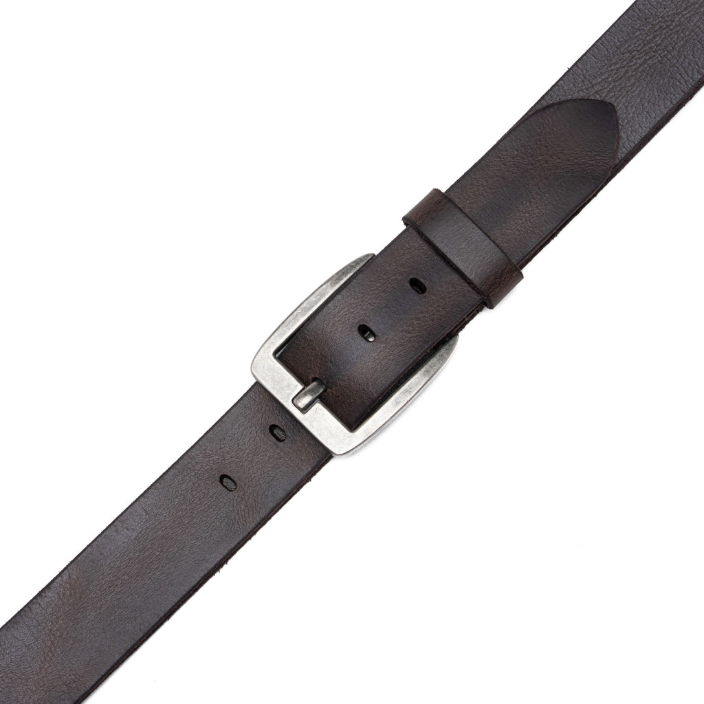 Close view of brown leather belt buckle, fixed keeper, pointed tip, and adjustment holes