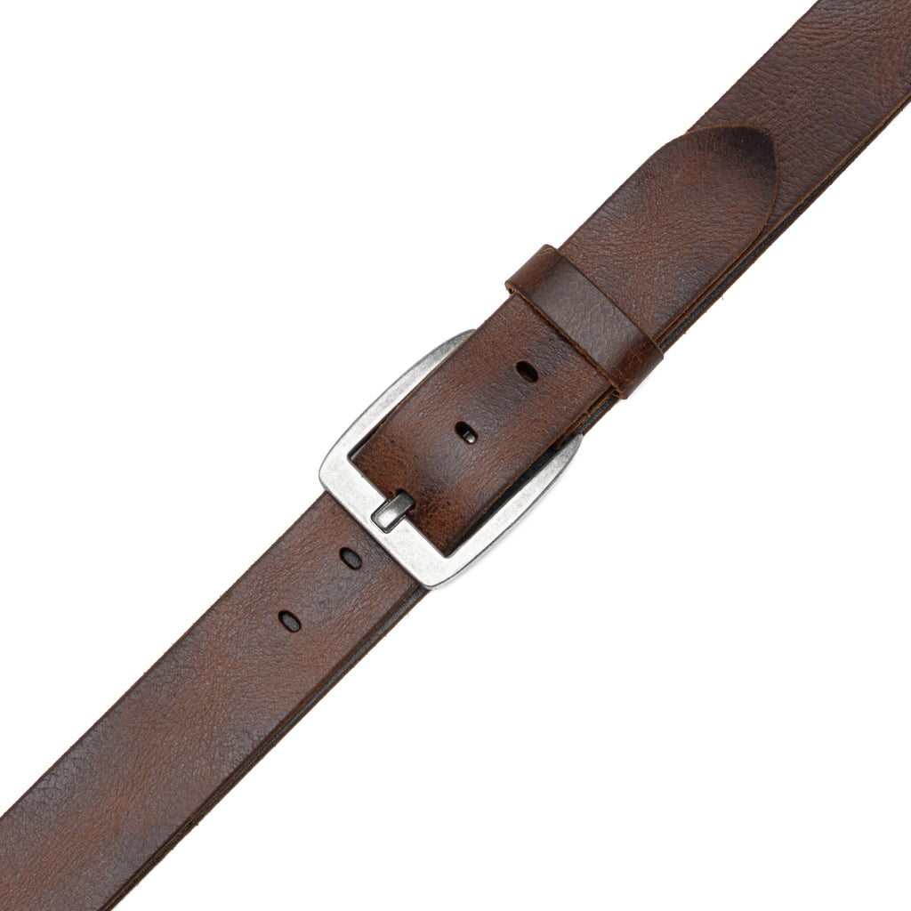Close view of cognac leather belt buckle, fixed keeper, pointed tip, and adjustment holes