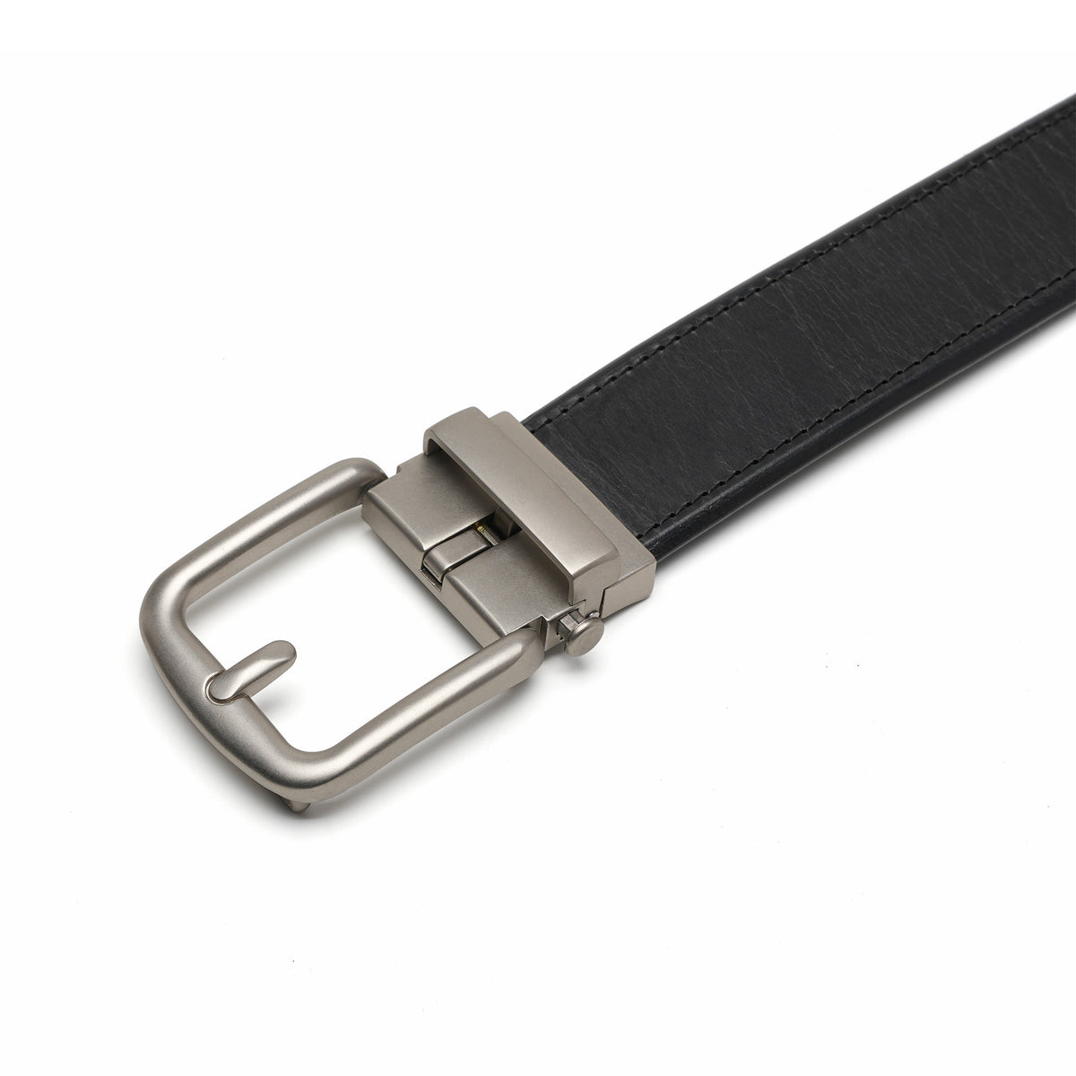 Close view of the black leather strap and matte rounded-rectangle automatic buckle